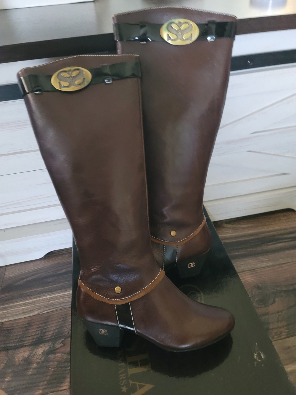 SHAN Brown Knee-High Heeled Riding Boots with Gold Emblem
